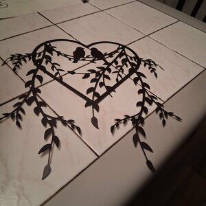 black metal wall art 10" X 11"  New 2 birds in a heart